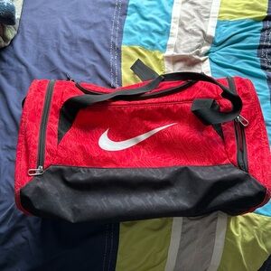 Red and black Nike sports duffel great condition, no tears or stains